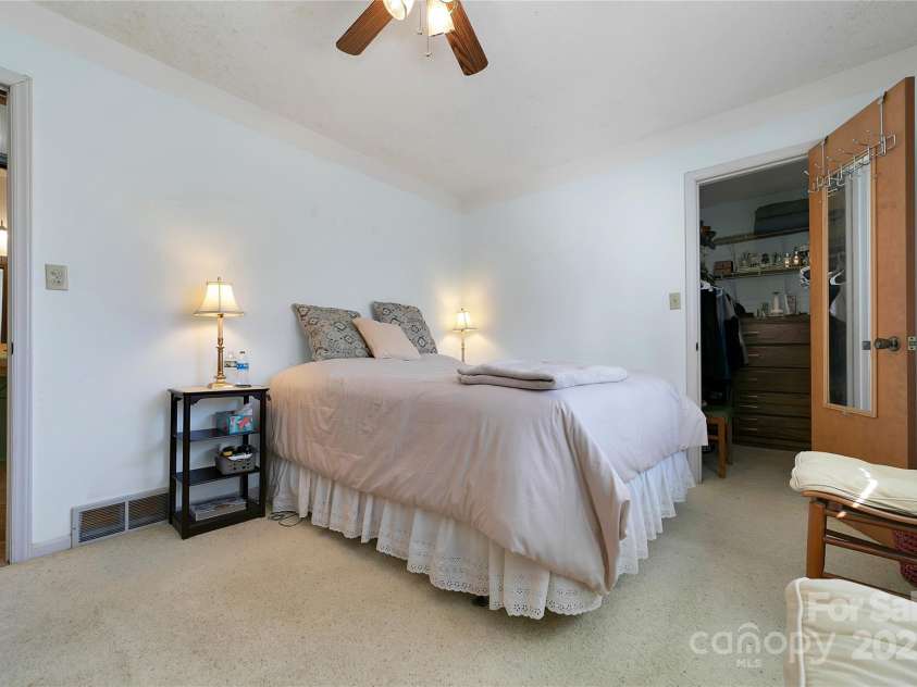 177 Walelu Court, Brevard, NC 28712.  MLS# CAR4223202, YatesRealty ID 1218. Guest Bedroom on Main Level with large walk-in closet