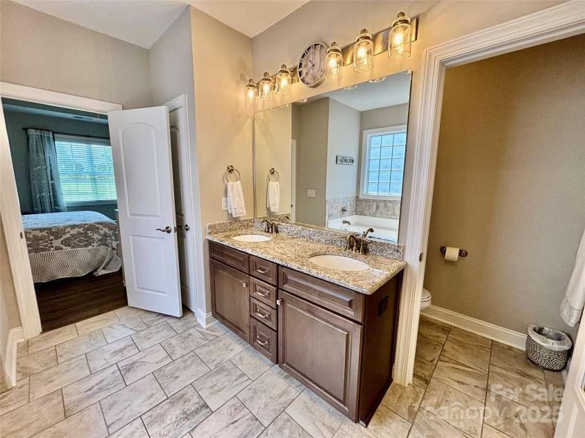 1024 Mayapple Way, Belmont, NC 28012.  MLS# CAR4223708, YatesRealty ID 12188. Double Vanity, Toilet Closet and Linen Closet
