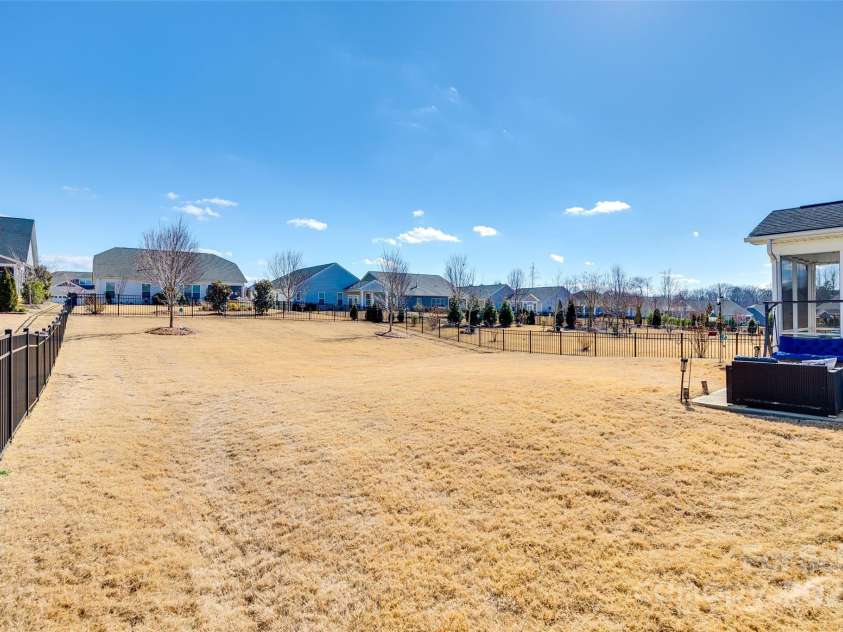 1024 Mayapple Way, Belmont, NC 28012.  MLS# CAR4223708, YatesRealty ID 12188. One of the largest lots in McLean Conservancy, and is fully fenced in!