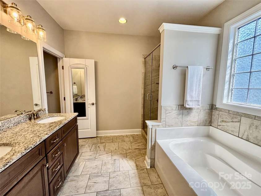 1024 Mayapple Way, Belmont, NC 28012.  MLS# CAR4223708, YatesRealty ID 12188. Primary Bath with shower and garden tub