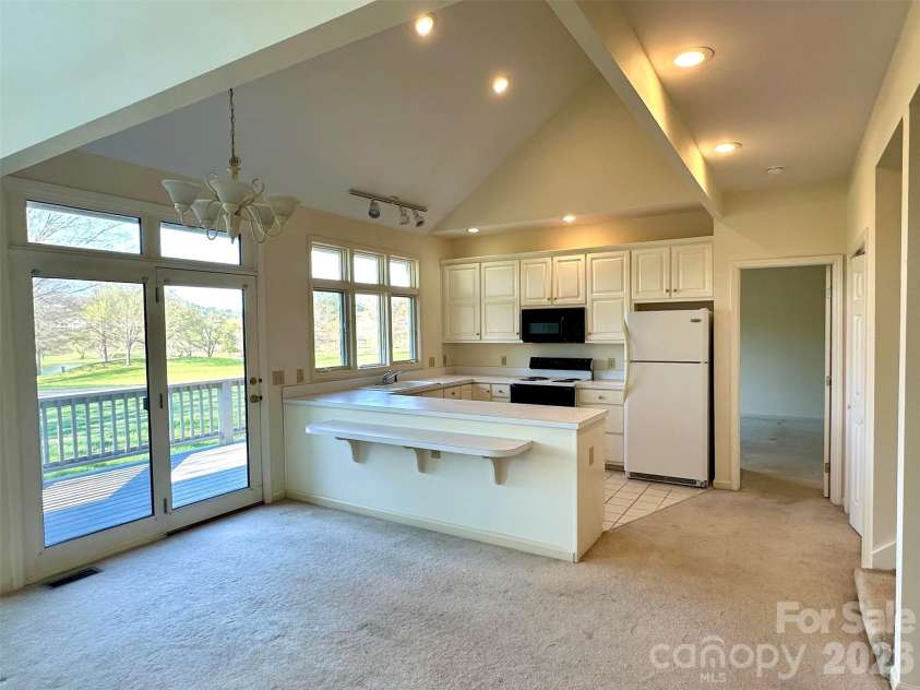 311 Landing Drive, Jefferson, NC 28640.  MLS# CAR4368622, YatesRealty ID 12190. 