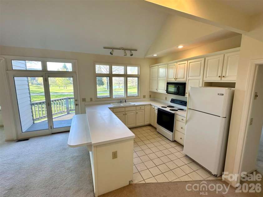 311 Landing Drive, Jefferson, NC 28640.  MLS# CAR4368622, YatesRealty ID 12190. 