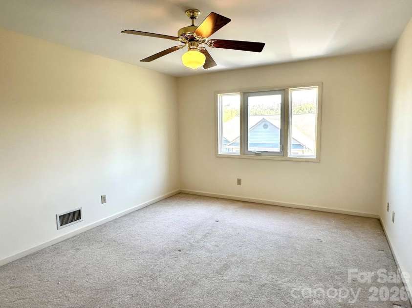 311 Landing Drive, Jefferson, NC 28640.  MLS# CAR4368622, YatesRealty ID 12190. 