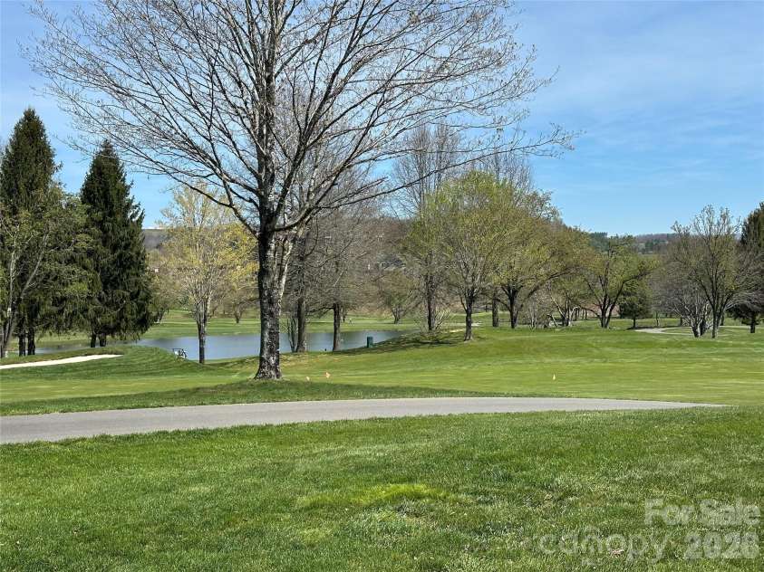 311 Landing Drive, Jefferson, NC 28640.  MLS# CAR4368622, YatesRealty ID 12190. 