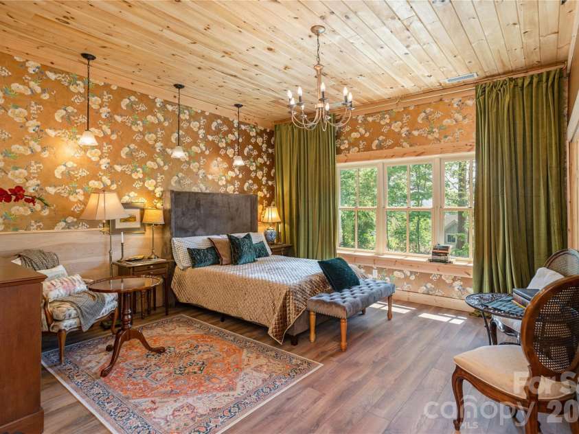 106 McCauley Drive, Asheville, NC 28803.  MLS# CAR4366972, YatesRealty ID 12192. Lower Level Primary Bedroom