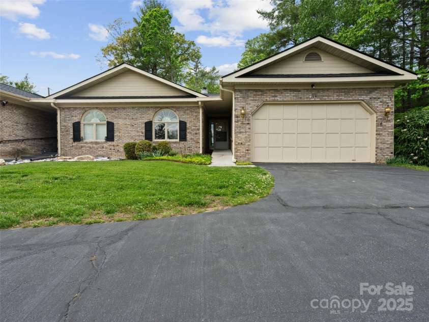 933 Kanuga Road, Hendersonville, NC 28739.  MLS# CAR4250849, YatesRealty ID 12192. 