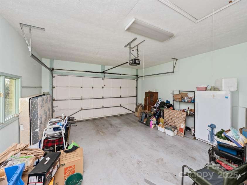 933 Kanuga Road, Hendersonville, NC 28739.  MLS# CAR4250849, YatesRealty ID 12192. 