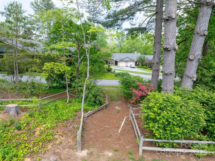 933 Kanuga Road, Hendersonville, NC 28739.  MLS# CAR4250849, YatesRealty ID 12192. 