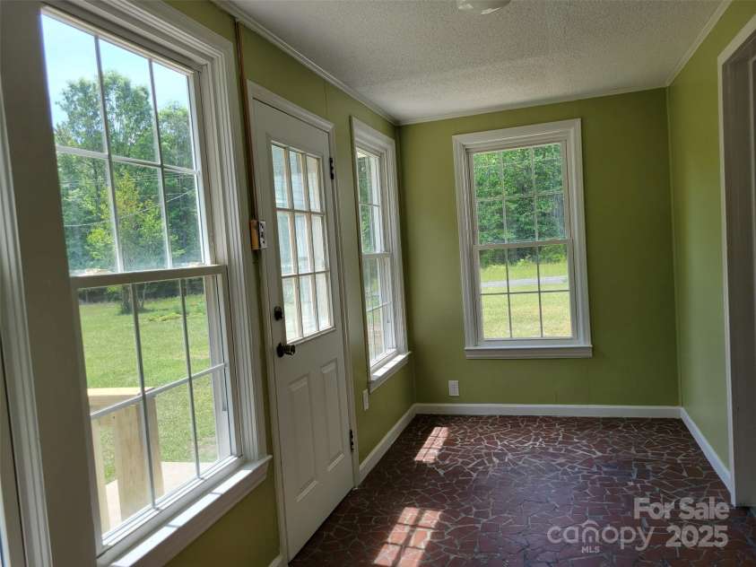 3634 Cartledge Creek Road, Mount Gilead, NC 27306.  MLS# CAR4253868, YatesRealty ID 12197. Closed in Porch