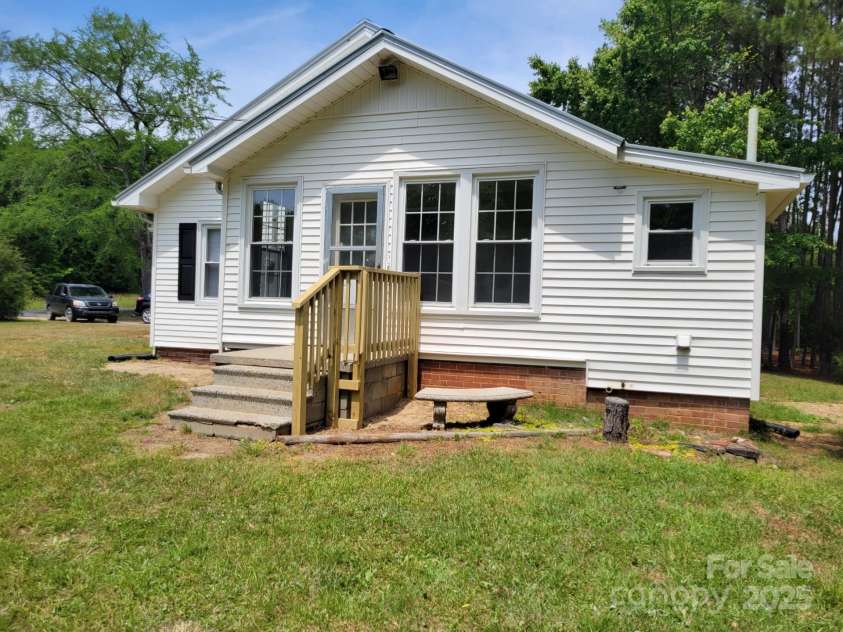 3634 Cartledge Creek Road, Mount Gilead, NC 27306.  MLS# CAR4253868, YatesRealty ID 12197. Side of house