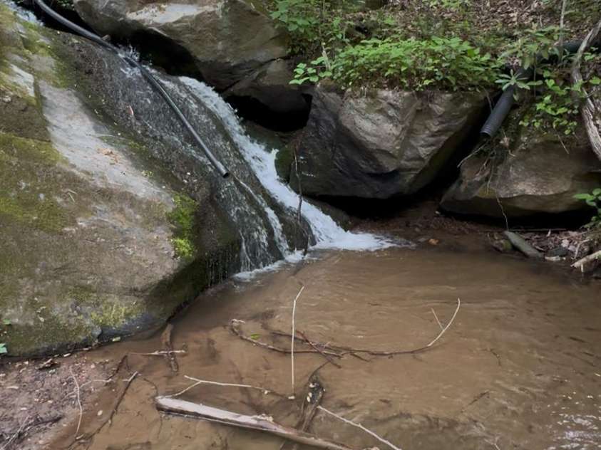 1294 Waites Hollifield Road, Marion, NC 28752.  MLS# CAR4256633, YatesRealty ID 12201. Waterfall on property