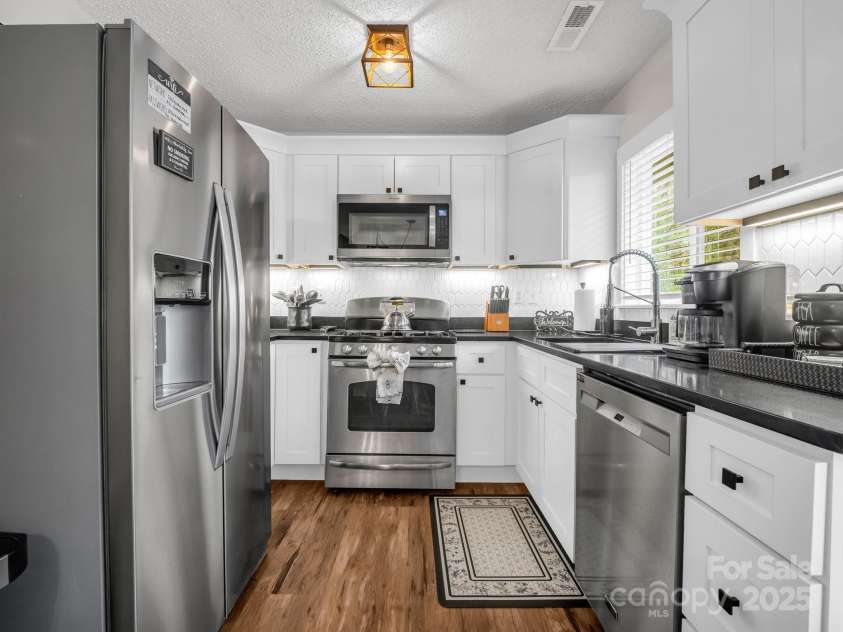 206 Knob Creek Road, Pisgah Forest, NC 28768.  MLS# CAR4241058, YatesRealty ID 12209. 