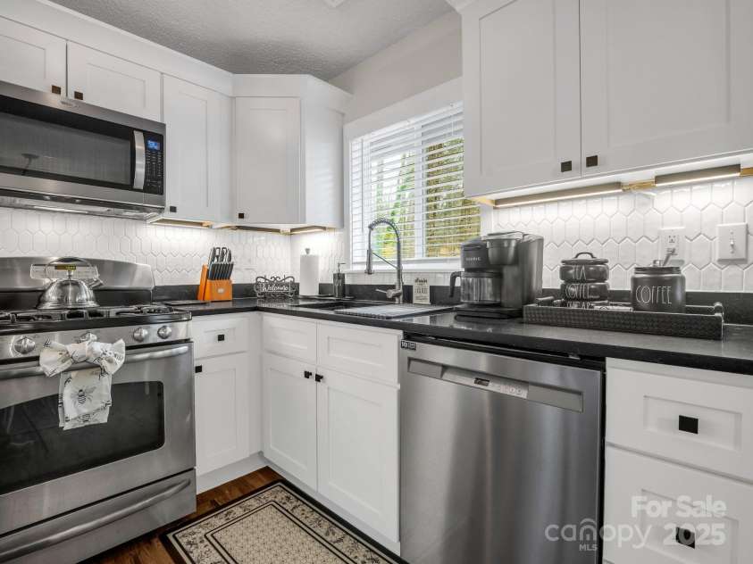 206 Knob Creek Road, Pisgah Forest, NC 28768.  MLS# CAR4241058, YatesRealty ID 12209. 