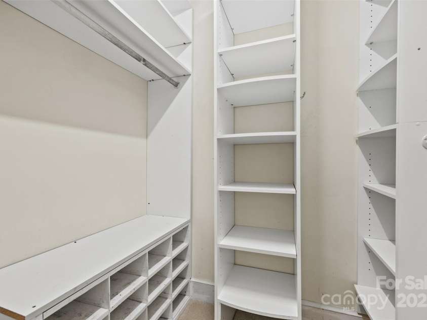 7103 Forest Ridge Road, Matthews, NC 28104.  MLS# CAR4255751, YatesRealty ID 12216. 2 custom primary closets