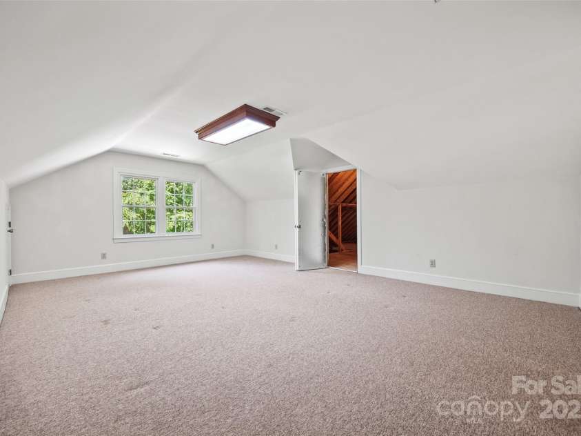 7103 Forest Ridge Road, Matthews, NC 28104.  MLS# CAR4255751, YatesRealty ID 12216. Bonus room w/ access to walk-in storage