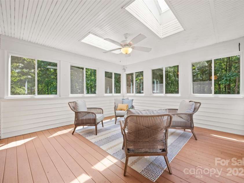 7103 Forest Ridge Road, Matthews, NC 28104.  MLS# CAR4255751, YatesRealty ID 12216. Bright porch with all season windows