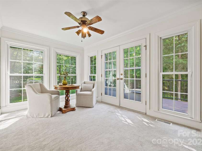 7103 Forest Ridge Road, Matthews, NC 28104.  MLS# CAR4255751, YatesRealty ID 12216. Sunroom w/ balcony
