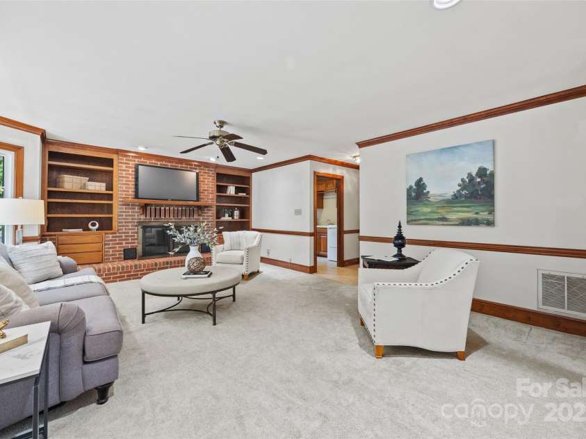 7103 Forest Ridge Road, Matthews, NC 28104.  MLS# CAR4255751, YatesRealty ID 12216. Terrific size family room open to kitchen and w/gas fireplace