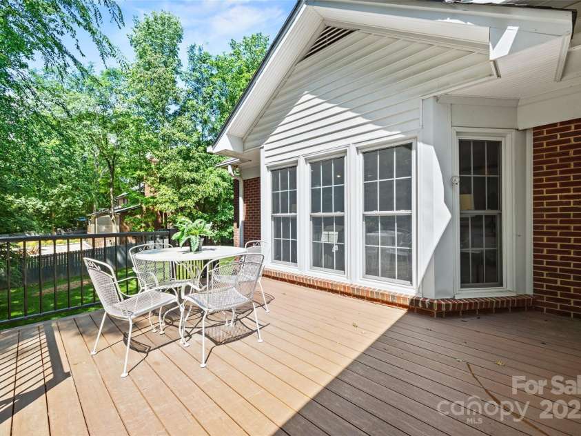 7103 Forest Ridge Road, Matthews, NC 28104.  MLS# CAR4255751, YatesRealty ID 12216. Trex deck off of screenporch