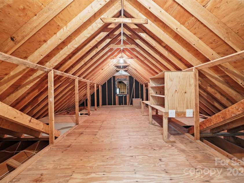 7103 Forest Ridge Road, Matthews, NC 28104.  MLS# CAR4255751, YatesRealty ID 12216. Walk-in attic storage