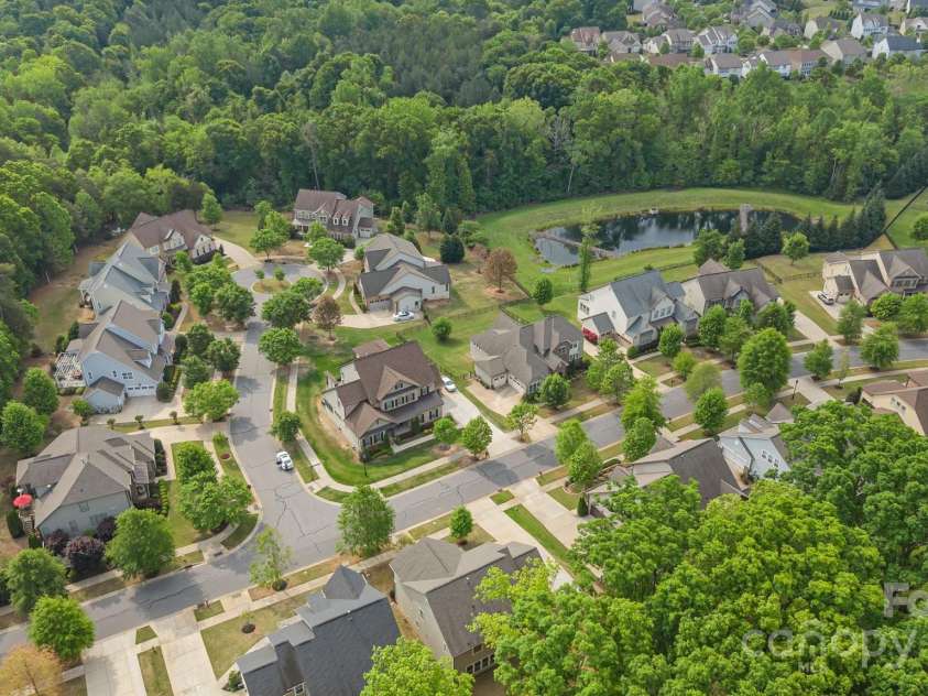 11304 Preservation Lane, Charlotte, NC 28278.  MLS# CAR4249820, YatesRealty ID 12218. A nice overhead view from behind the home!  This section of Chapel Cover offers mature trees, a park, sidewalks and generous lots!