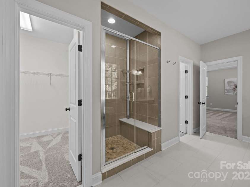 11304 Preservation Lane, Charlotte, NC 28278.  MLS# CAR4249820, YatesRealty ID 12218. Beautiful tile floors in the owner's bathroom!