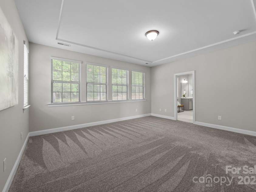 11304 Preservation Lane, Charlotte, NC 28278.  MLS# CAR4249820, YatesRealty ID 12218. Owner's suite with windows overlooking the backyard