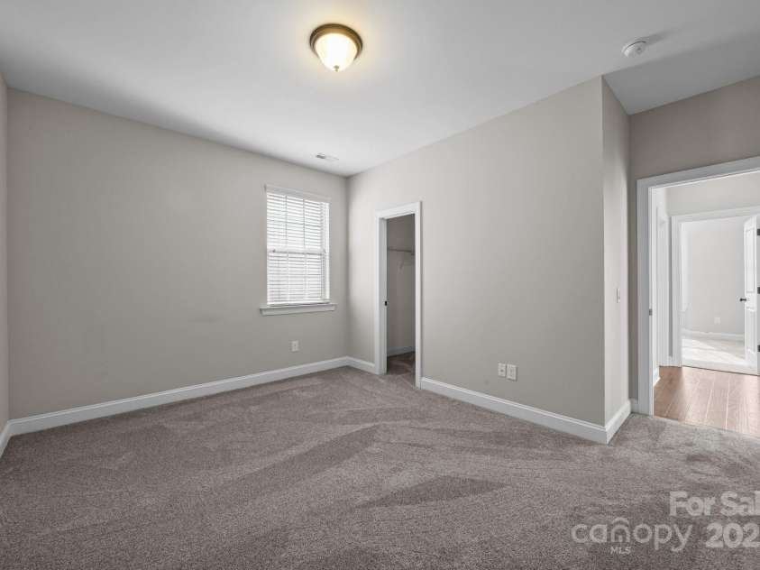 11304 Preservation Lane, Charlotte, NC 28278.  MLS# CAR4249820, YatesRealty ID 12218. Secondary bedroom (bedroom 4) with brand new carpet