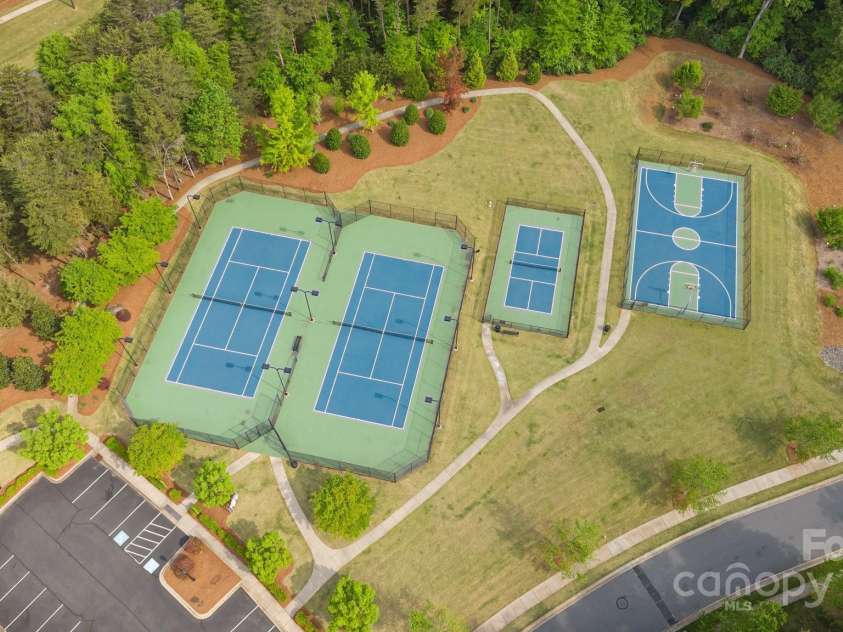 11304 Preservation Lane, Charlotte, NC 28278.  MLS# CAR4249820, YatesRealty ID 12218. Tennis and pickleball and basketball! And just at the end of this road is a trail that leads to the lake where you can launch your kayak!