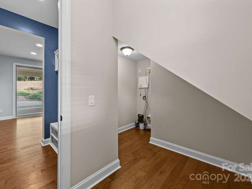 11304 Preservation Lane, Charlotte, NC 28278.  MLS# CAR4249820, YatesRealty ID 12218. The storage room is actually big enough that it could be a home office or little craft room!  Did someone say wine cellar?!