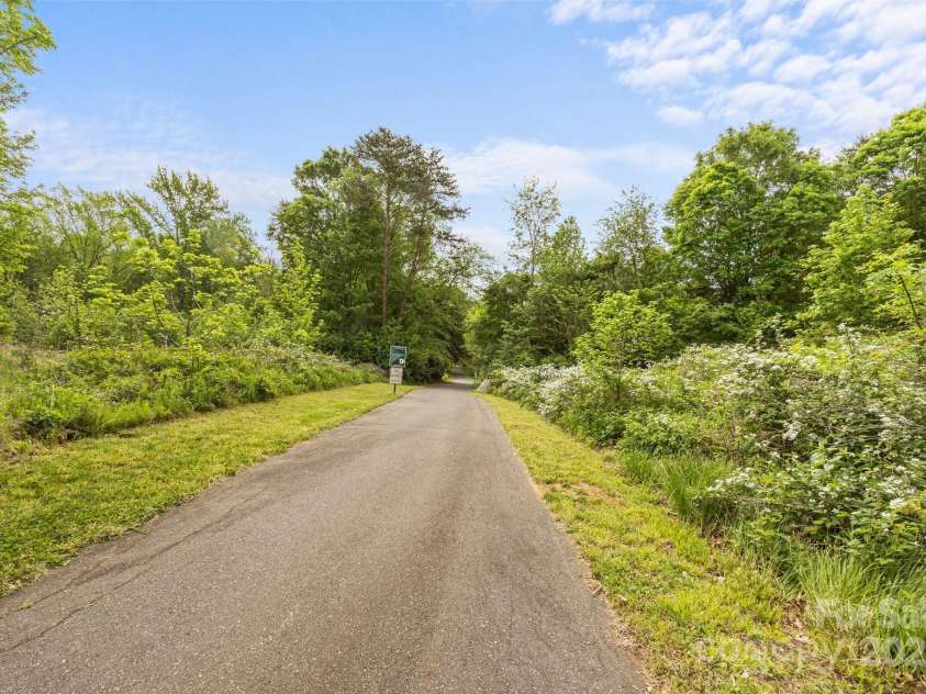11304 Preservation Lane, Charlotte, NC 28278.  MLS# CAR4249820, YatesRealty ID 12218. This trail leads from the neighborhood right into Winget Park.  A huge local city park with soccer fields, frisbee golf, volleyball, and more!