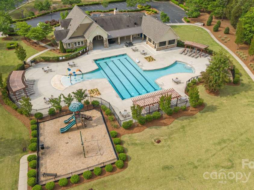 11304 Preservation Lane, Charlotte, NC 28278.  MLS# CAR4249820, YatesRealty ID 12218. Welcome to the amenities center!!  Playground, Pool, fitness center, ball field, and more!