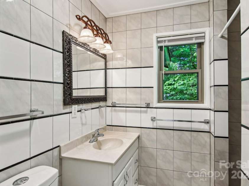 50 Whiskey Creek Road, Hendersonville, NC 28739.  MLS# CAR4257295, YatesRealty ID 12221. 