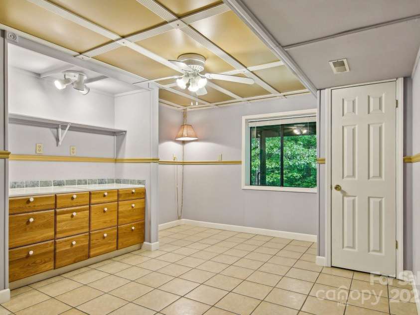 50 Whiskey Creek Road, Hendersonville, NC 28739.  MLS# CAR4257295, YatesRealty ID 12221. Craft room