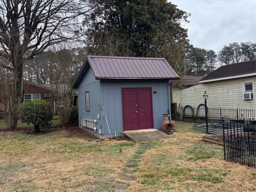 503 9th Avenue, Conover, NC 28613.  MLS# CAR4352494, YatesRealty ID 12226. 12 x 16 wired workshop sits on a solid concrete pad