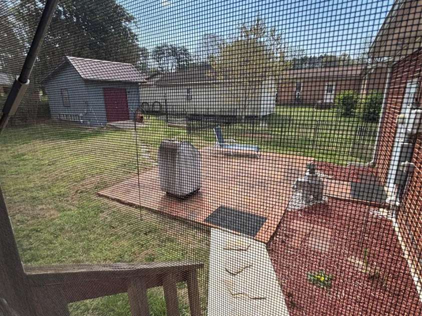 503 9th Avenue, Conover, NC 28613.  MLS# CAR4352494, YatesRealty ID 12226. Breezeway overlooks a private patio