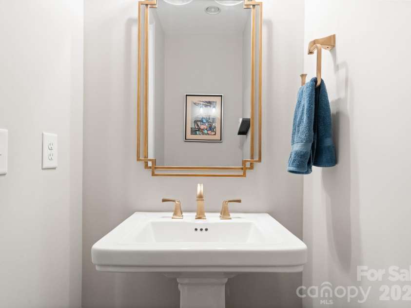 13630 Tranquil Day Drive, Matthews, NC 28105.  MLS# CAR4361521, YatesRealty ID 12229. Half Bathroom Main Level