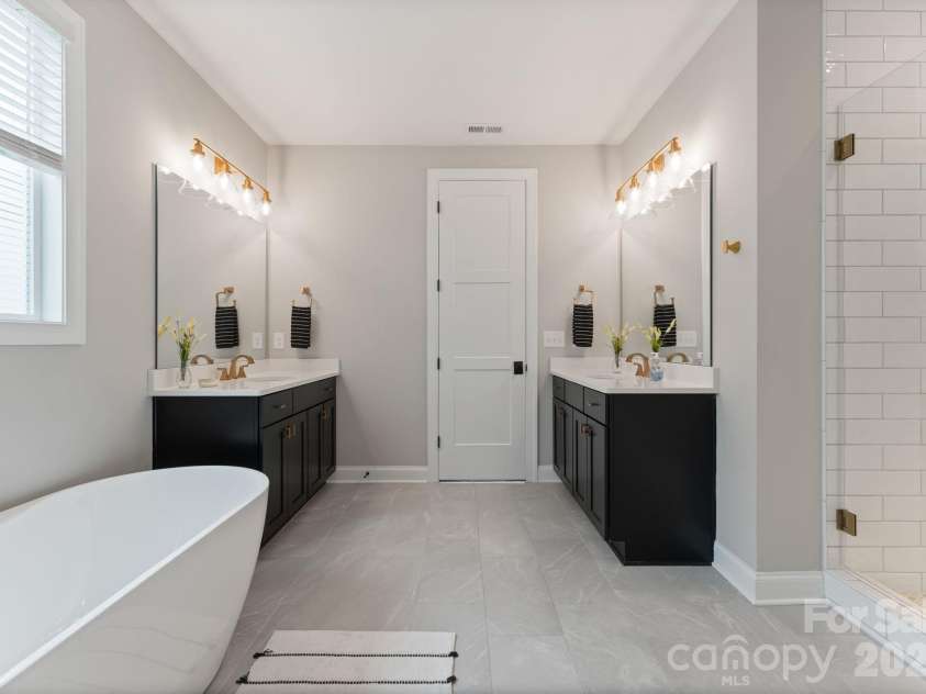 13630 Tranquil Day Drive, Matthews, NC 28105.  MLS# CAR4361521, YatesRealty ID 12229. Primary Bathroom