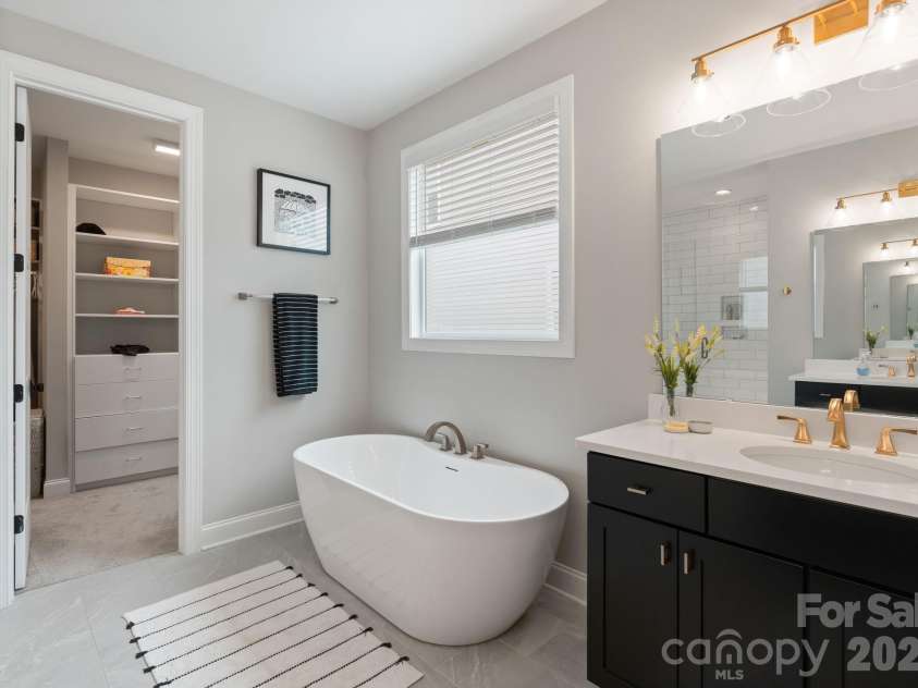 13630 Tranquil Day Drive, Matthews, NC 28105.  MLS# CAR4361521, YatesRealty ID 12229. Primary Bathroom