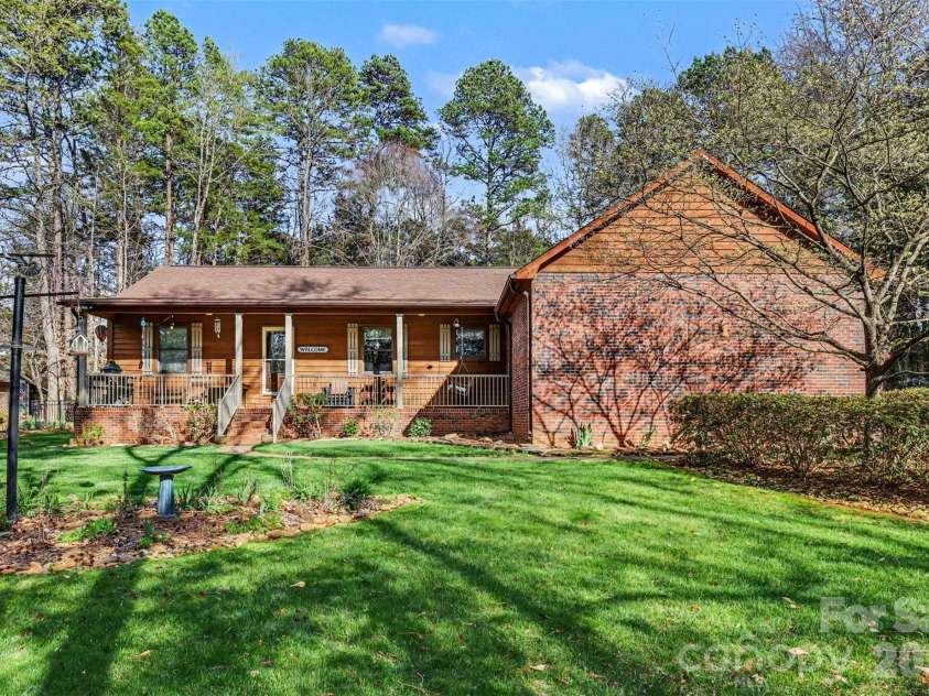 2199 Coddle Creek Highway, Mooresville, NC 28115.  MLS# CAR4359569, YatesRealty ID 12235. Brick and Cedar Exterior
