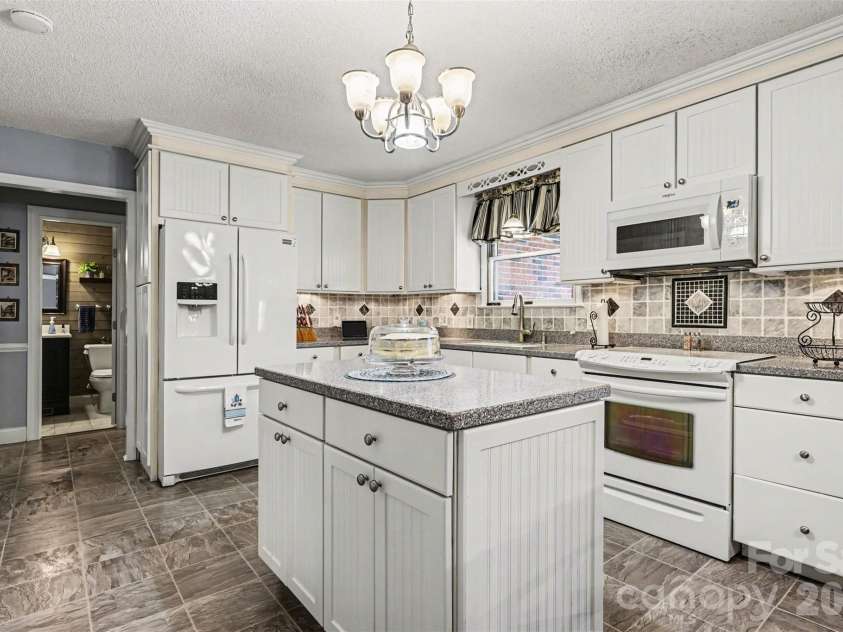 2199 Coddle Creek Highway, Mooresville, NC 28115.  MLS# CAR4359569, YatesRealty ID 12235. Kitchen with Island