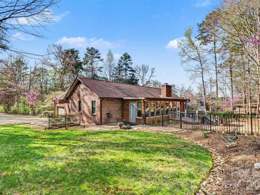 2199 Coddle Creek Highway, Mooresville, NC 28115.  MLS# CAR4359569, YatesRealty ID 12235. Patio and Side Yard