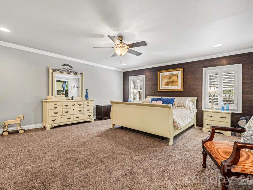 2199 Coddle Creek Highway, Mooresville, NC 28115.  MLS# CAR4359569, YatesRealty ID 12235. Spacious Primary Suite