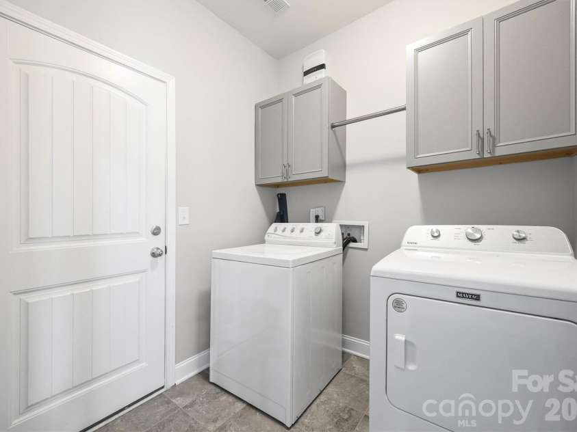 1129 Black Walnut Road, Clover, SC 29710.  MLS# CAR4334116, YatesRealty ID 12238. Main level laundry room w/ access to garage