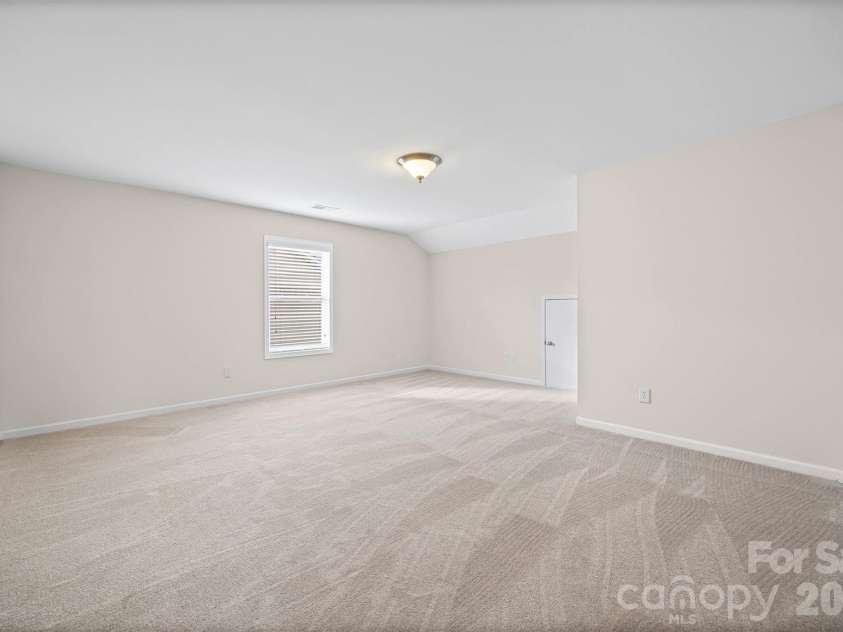 1129 Black Walnut Road, Clover, SC 29710.  MLS# CAR4334116, YatesRealty ID 12238. Upstairs bedroom #3 w/ walk-in closet and attic access