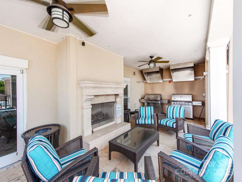 4620 Piedmont Row Drive, Charlotte, NC 28210.  MLS# CAR4300072, YatesRealty ID 1224. Grills & fireplace area.