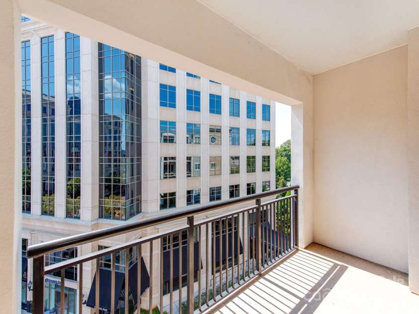 4620 Piedmont Row Drive, Charlotte, NC 28210.  MLS# CAR4300072, YatesRealty ID 1224. Large covered balcony.