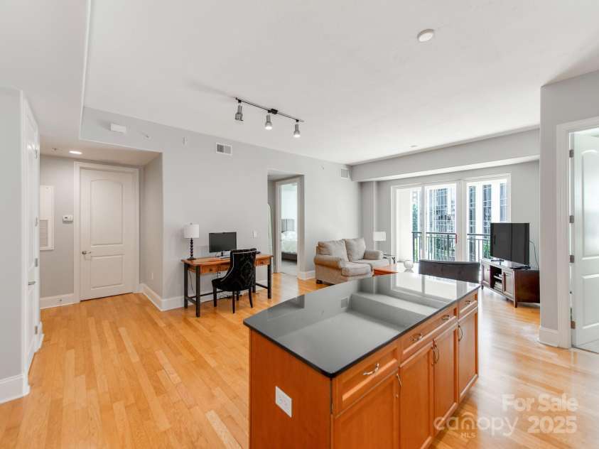 4620 Piedmont Row Drive, Charlotte, NC 28210.  MLS# CAR4300072, YatesRealty ID 1224. Large laundry/ utility room off foyer.