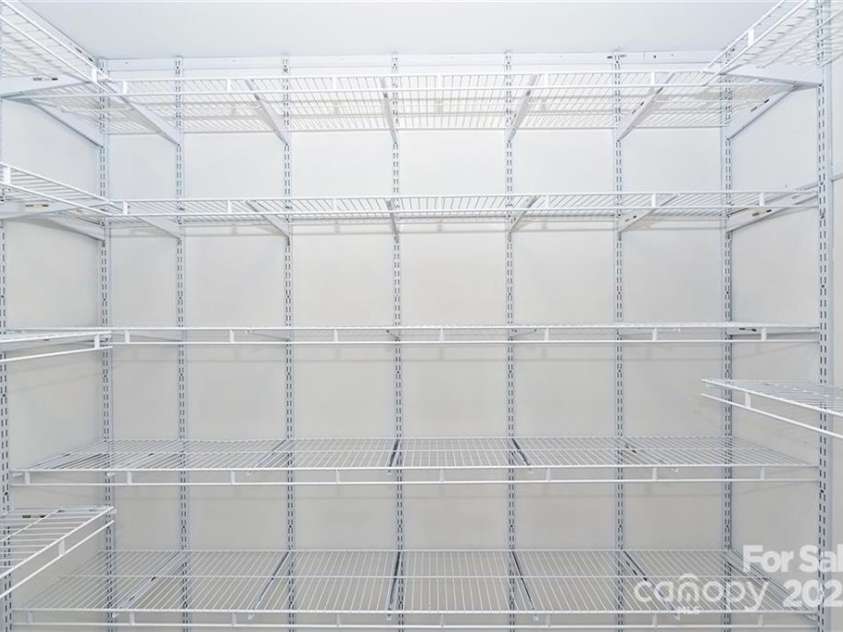 4620 Piedmont Row Drive, Charlotte, NC 28210.  MLS# CAR4300072, YatesRealty ID 1224. Laundry / utility rm closet off foyer