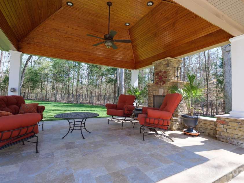 2017 Colorado Court, Lancaster, SC 29720.  MLS# CAR4239549, YatesRealty ID 12240. Covered Cabana with stacked stone gas fireplace